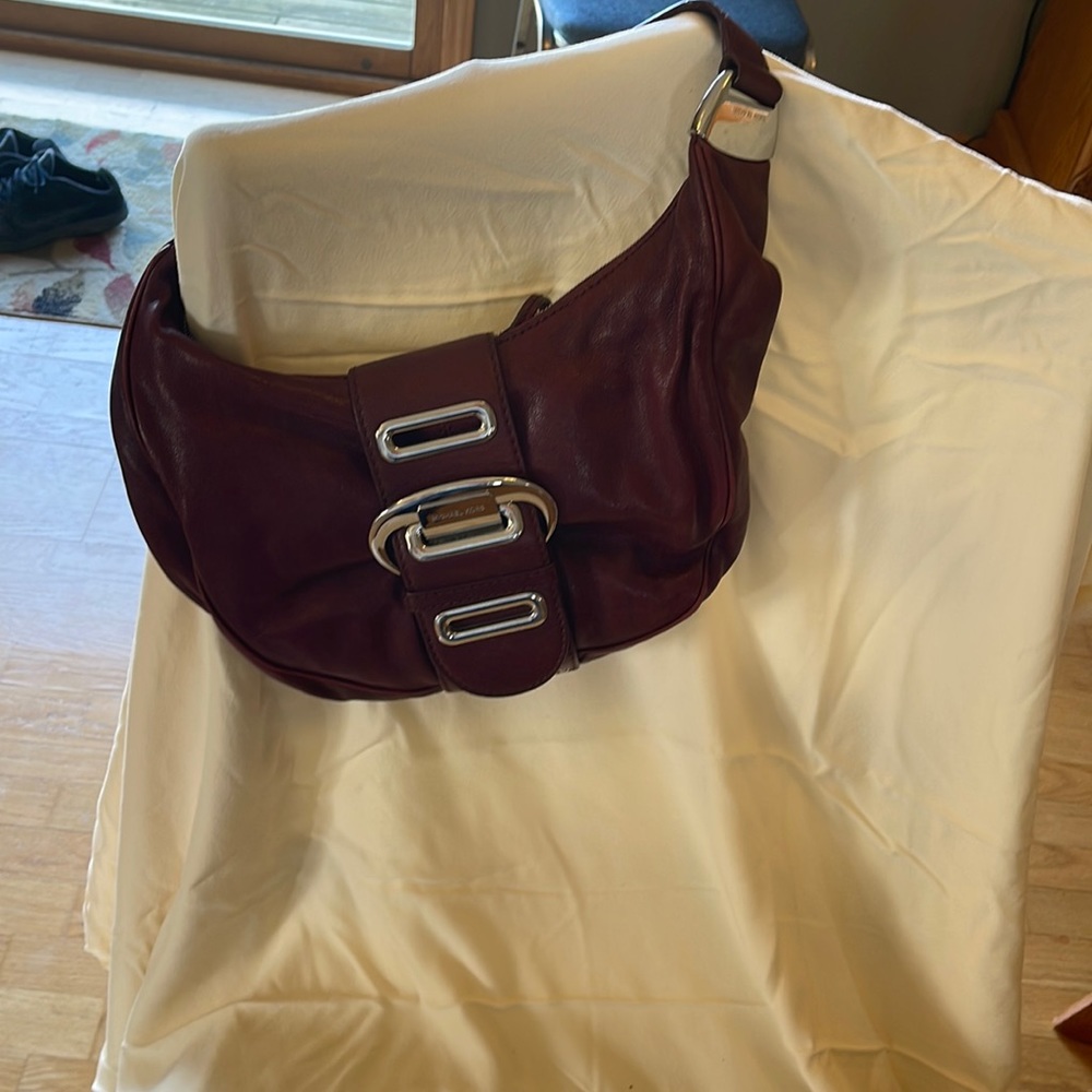 Michael Kors burgundy women's medium size purse with minimal usage